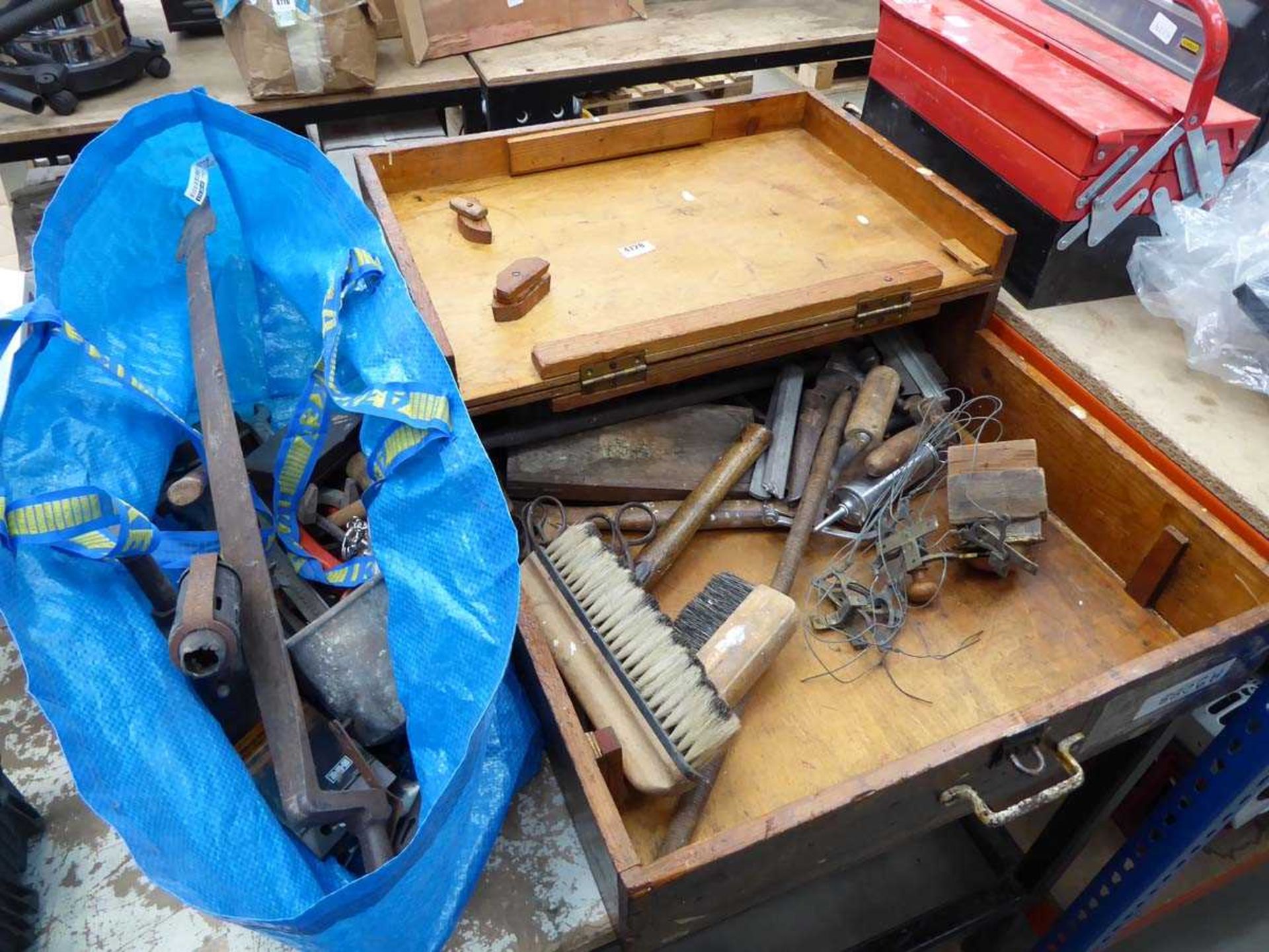 Large wooden toolbox of various tools, and large blue bag of assorted tools