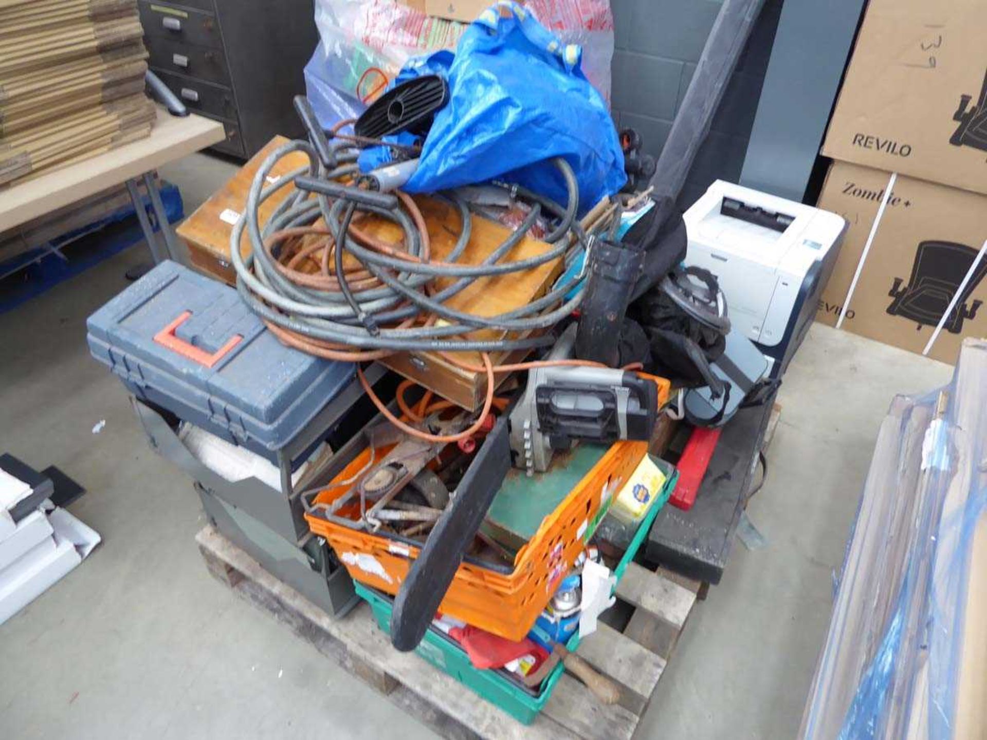 Pallet of assorted items inc. chainsaws, pipe, bike pumps, typewriters, tools etc.