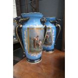 Pair of Victorian transfer printed vases with dog head finials