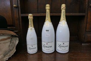 Three champagne bottles