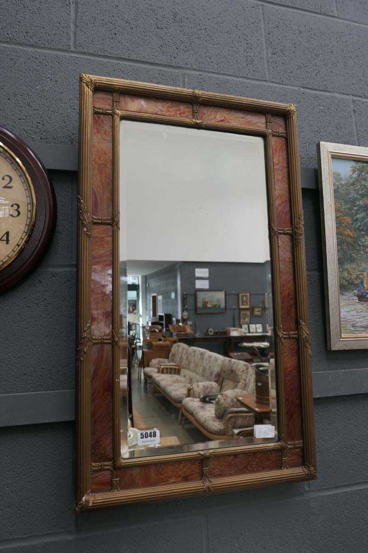 Rectangular bevelled mirror with faux marble frame