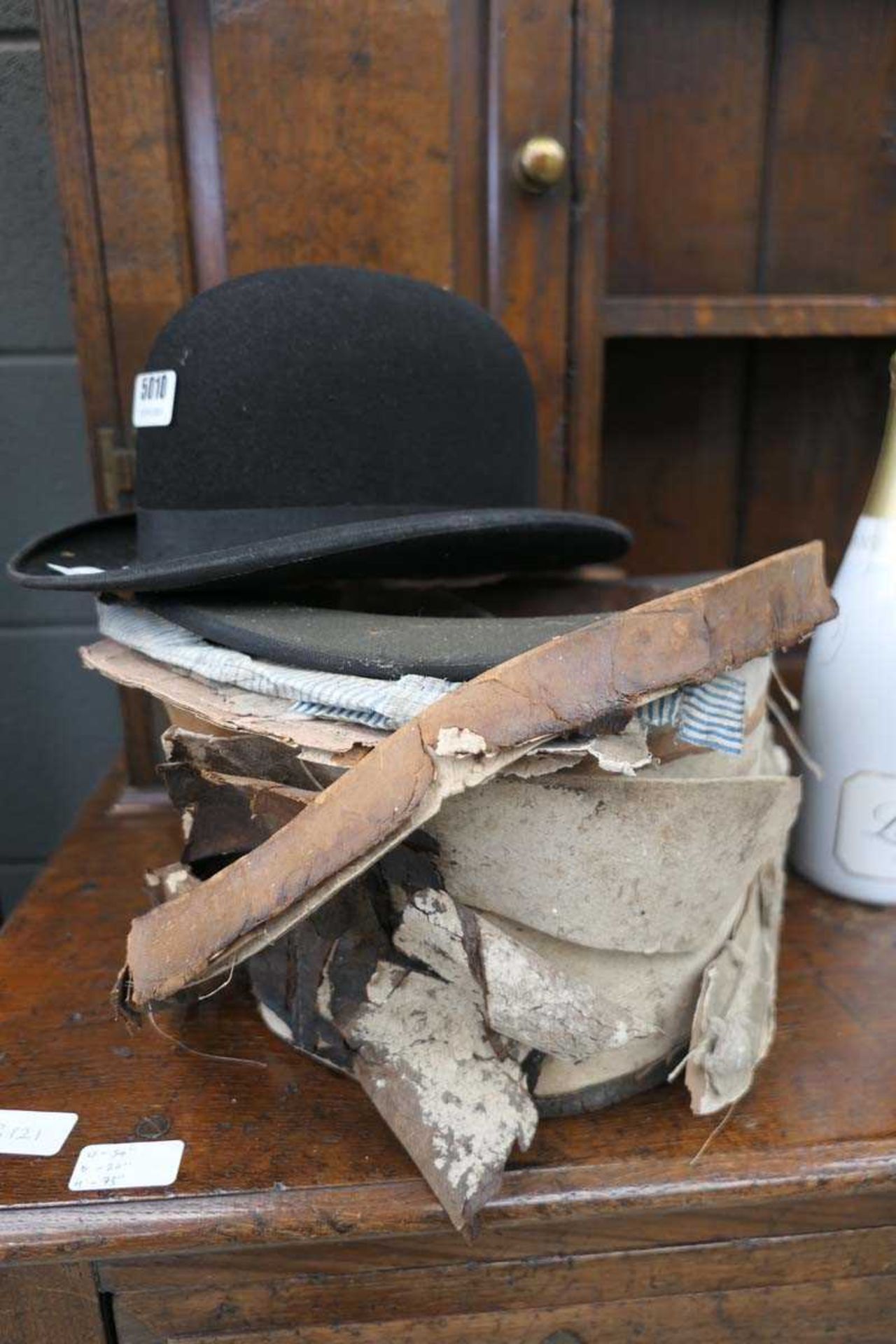 Two silk hats (for restoration) plus combs and brushes