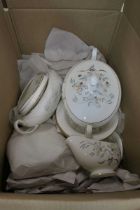 Box containing a quantity of Wedgwood honeysuckle patterned crockery