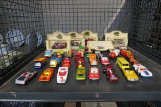 Cage containing boxed and loose die-cast vehicles