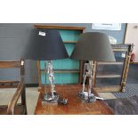 Pair of skeleton shaped table lamps