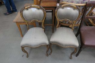 Pair of upholstered balloon back dining chairs