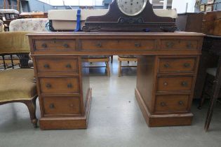 Edwardian twin pedestal desk with red leather surface