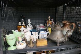 Cage containing ornamental figures, candlesticks, jugs, cruet set and teapot