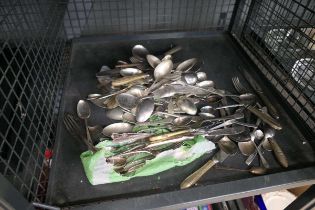Cage containing qty of loose cutlery
