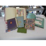 7 stamp albums containing stamps