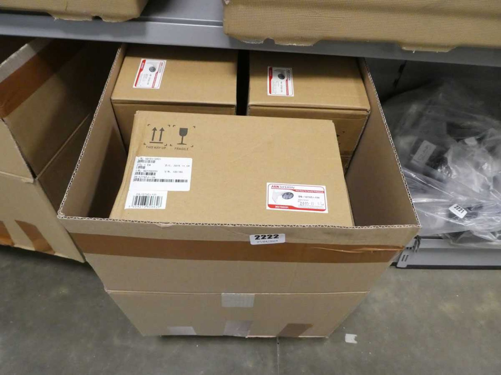 2 boxes containing Hik vision security lights