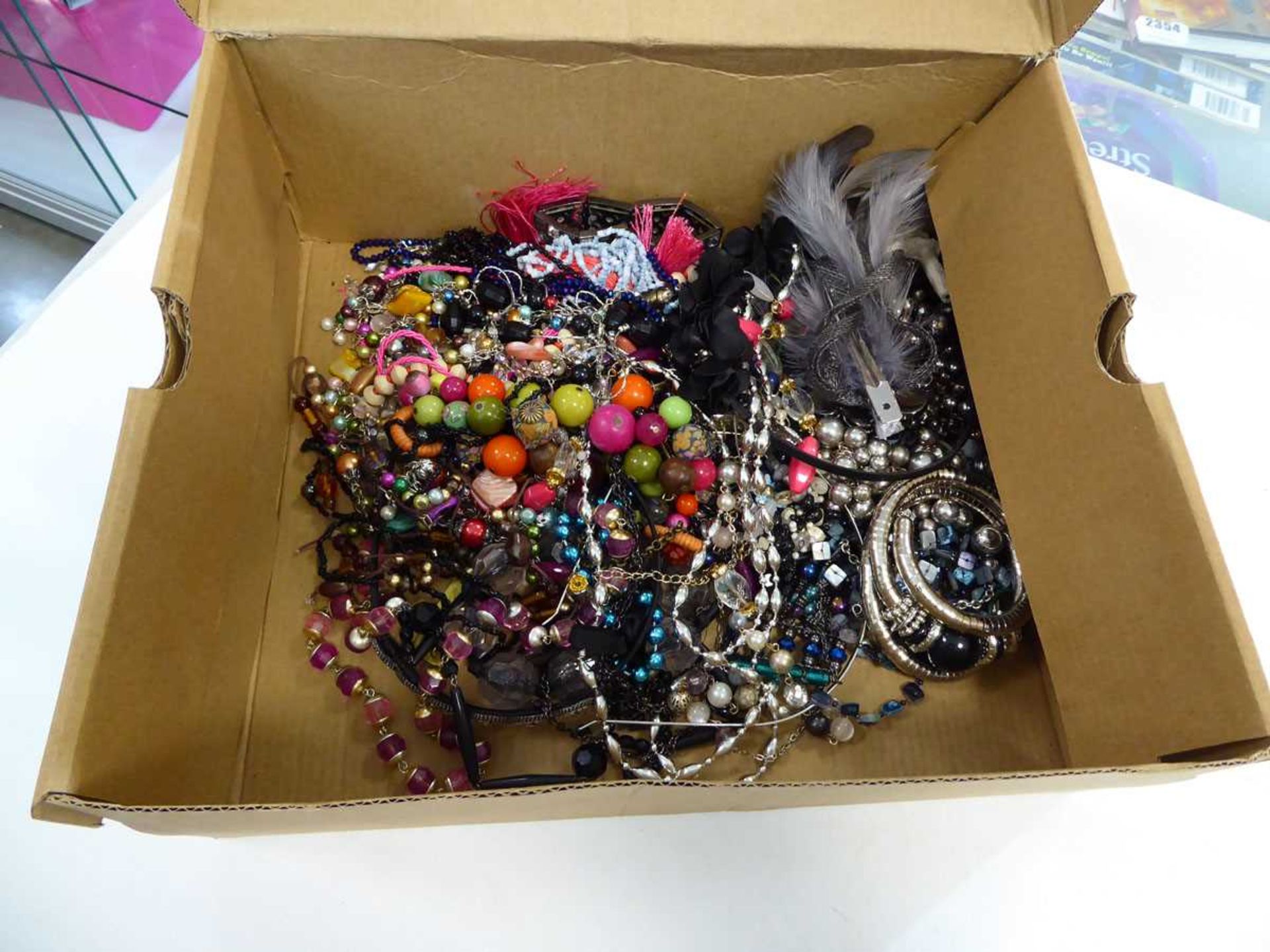 Box containing costume jewellery