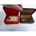 Two small boxes containing costume jewellery