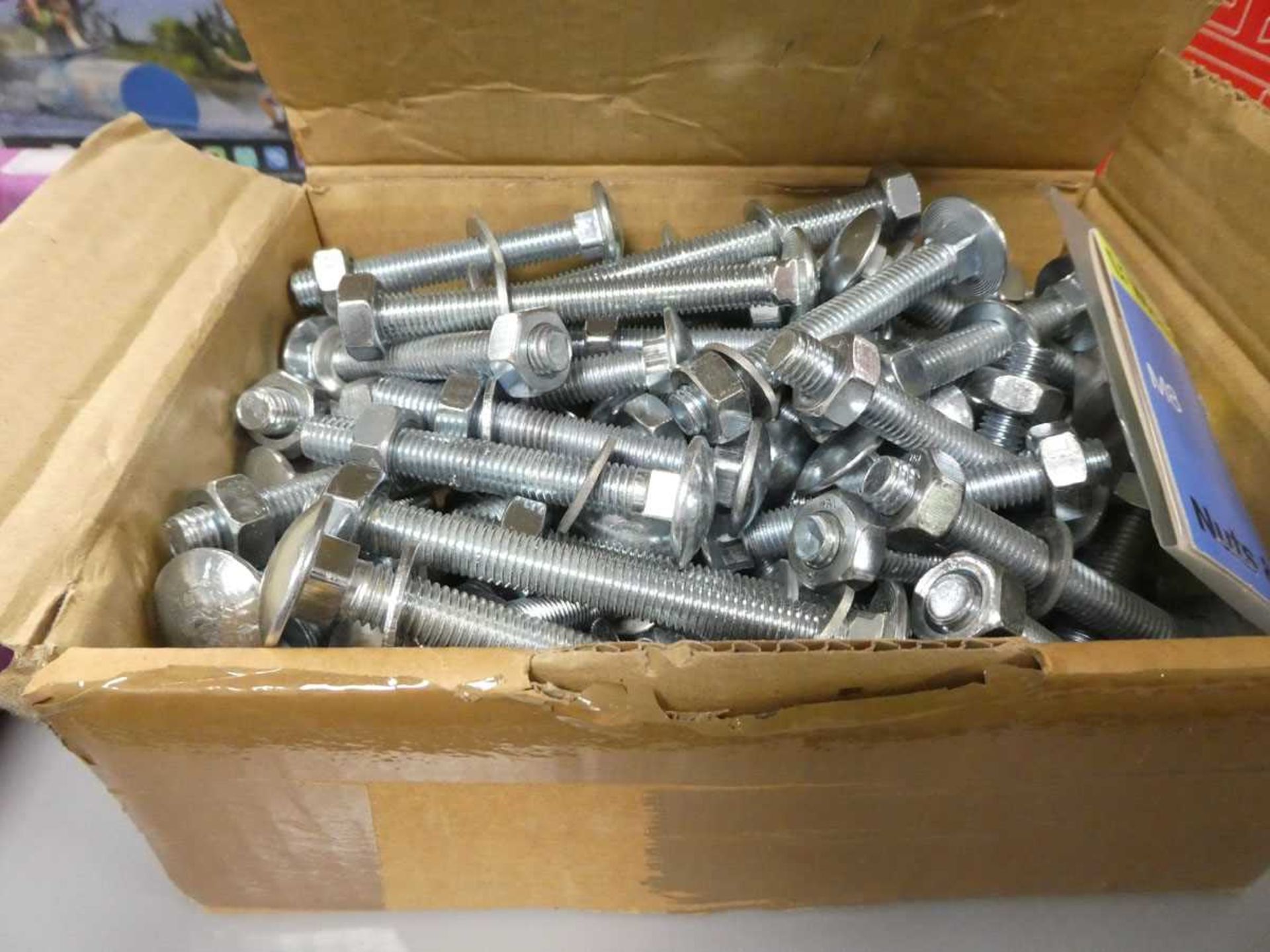 Box containing various nuts, bolts and washers
