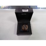 Hugo Boss sub-dial men's wristwatch with gold coloured face and black background and brown leather