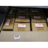 Box containing various wall brackets