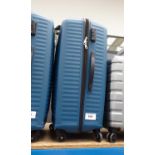 +VAT Large hard shelled American Tourister suitcase