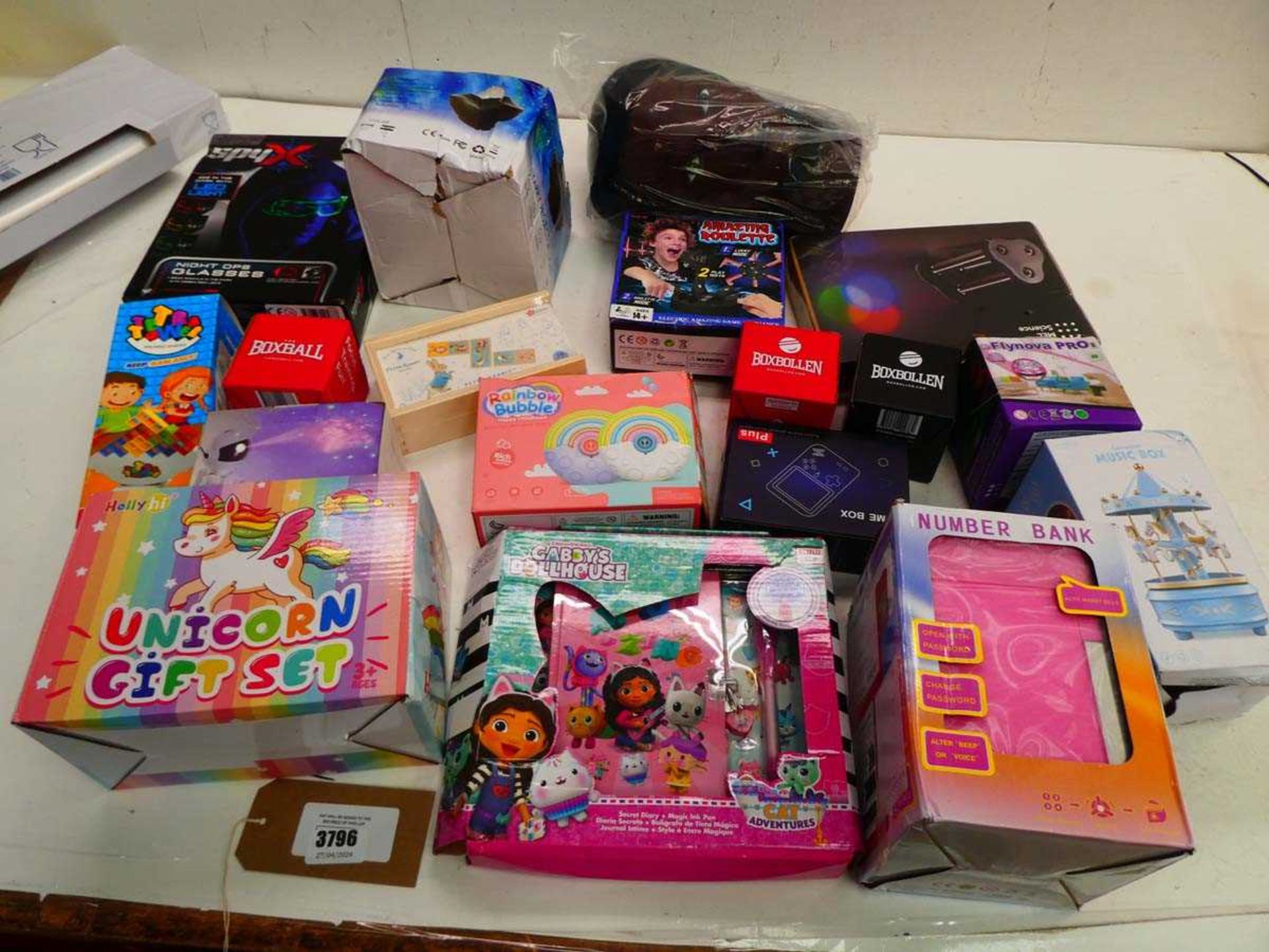 +VAT Selection of toys to include Gabby's Doll House, Money Number Bank, Spy Set, Unicorn gift
