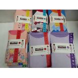 Approx. 30 Kirkland SIgnature kids 4 piece pyjama sets in various colours, sizes, and genders