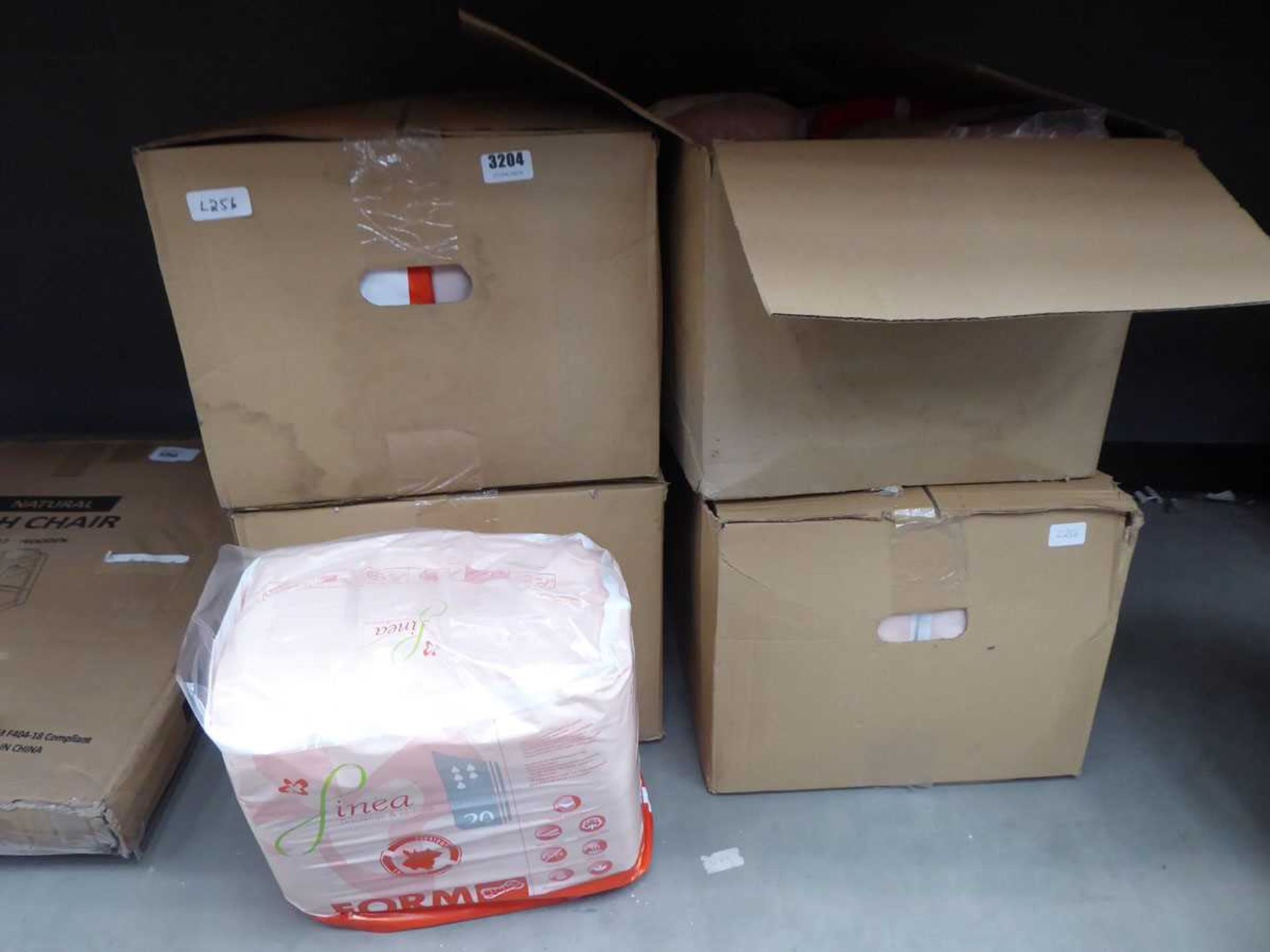 Boxes of incontinence pads