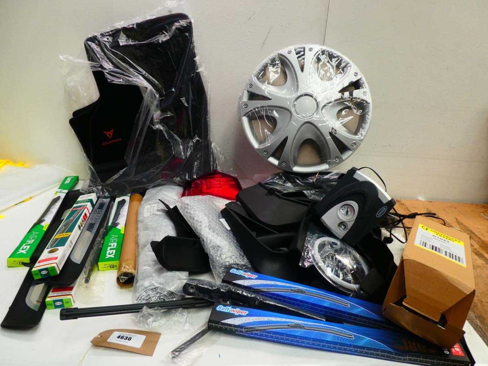 +VAT Box of various car parts to include wipers, cover, trims, lights, car mats, wheel trims,