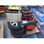 Pallet of assorted items including alloy wheel, tyres, trolley jack, axle stands, lights, etc