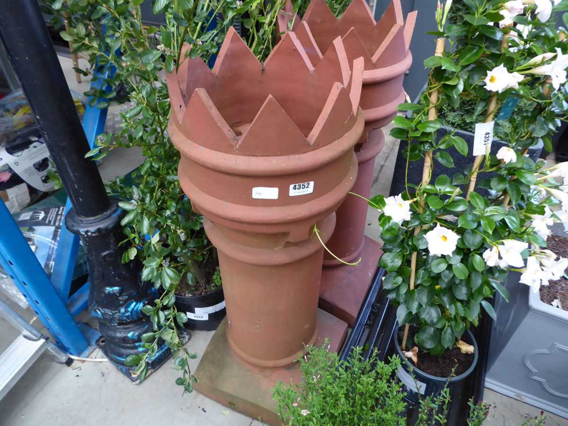 2 castellated topped terracotta chimney pots