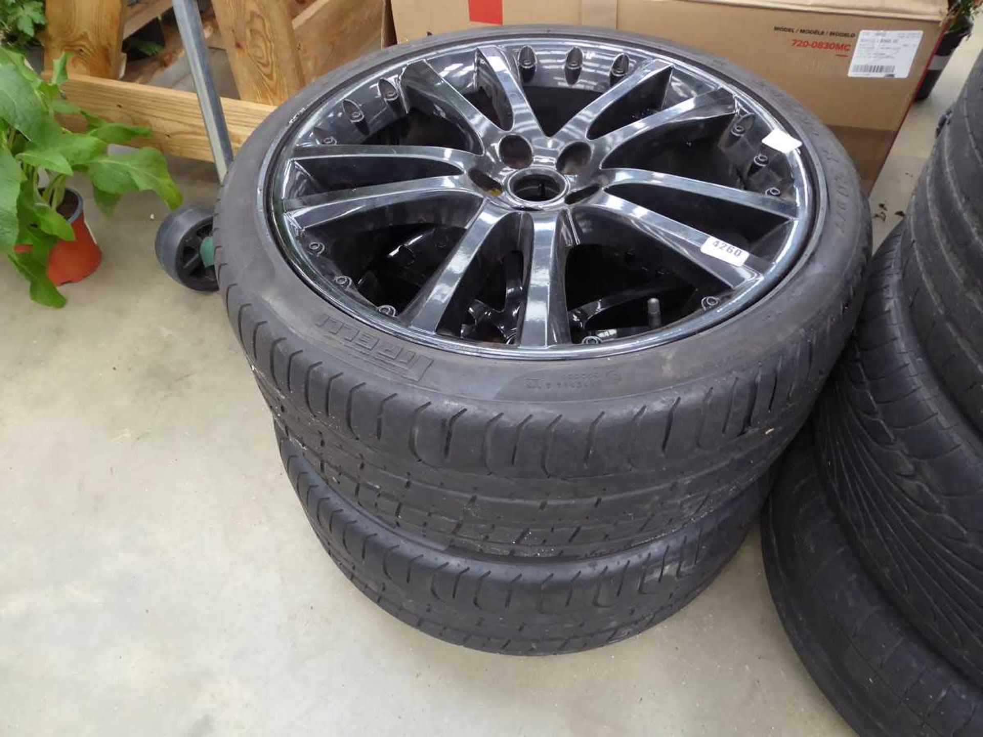 2 x large black alloy wheels and tyres, size 255x35x20