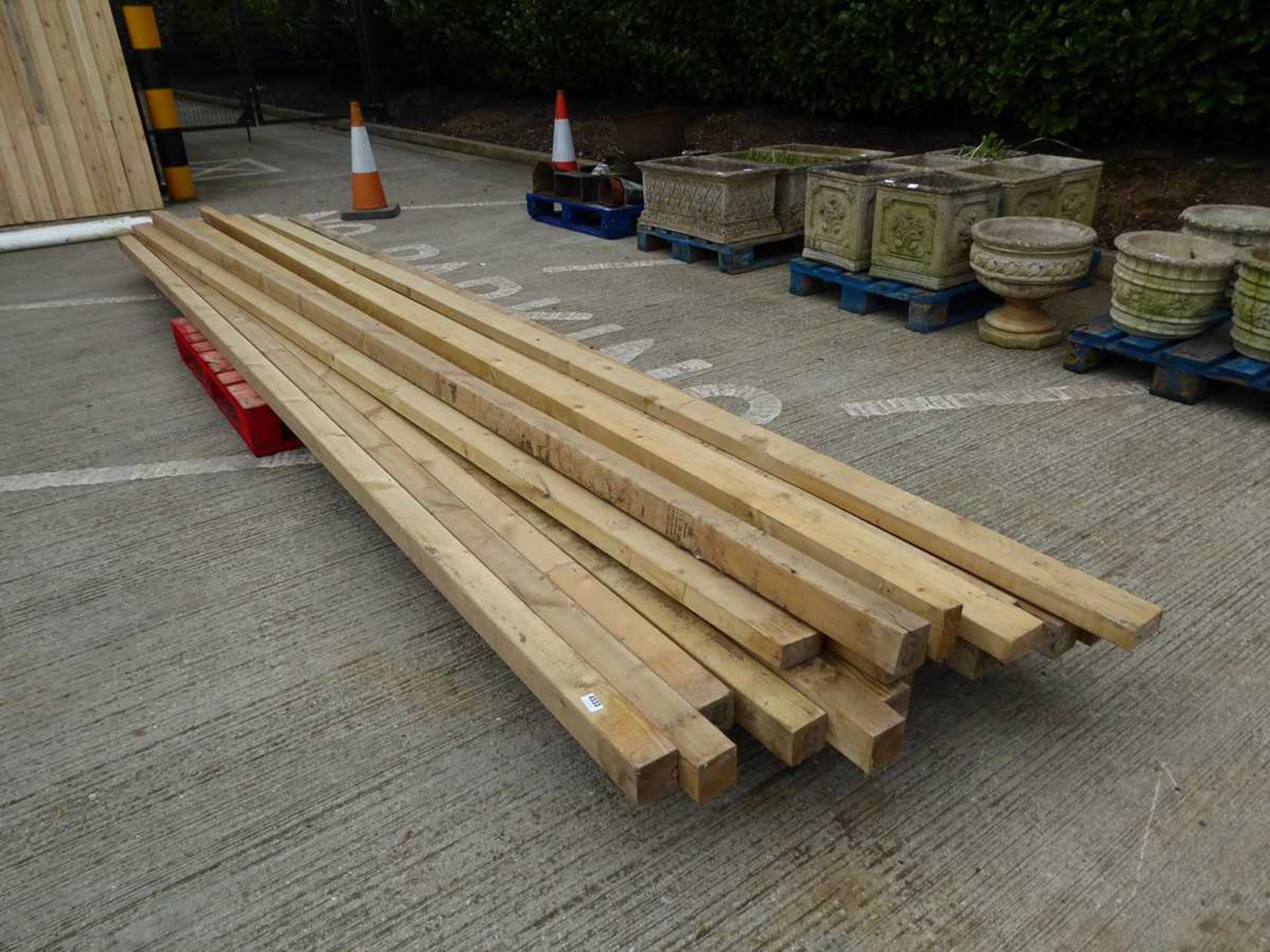 Large pallet of long lengths of timber