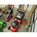 Red Mountfield petrol powered rotary mower with grass box
