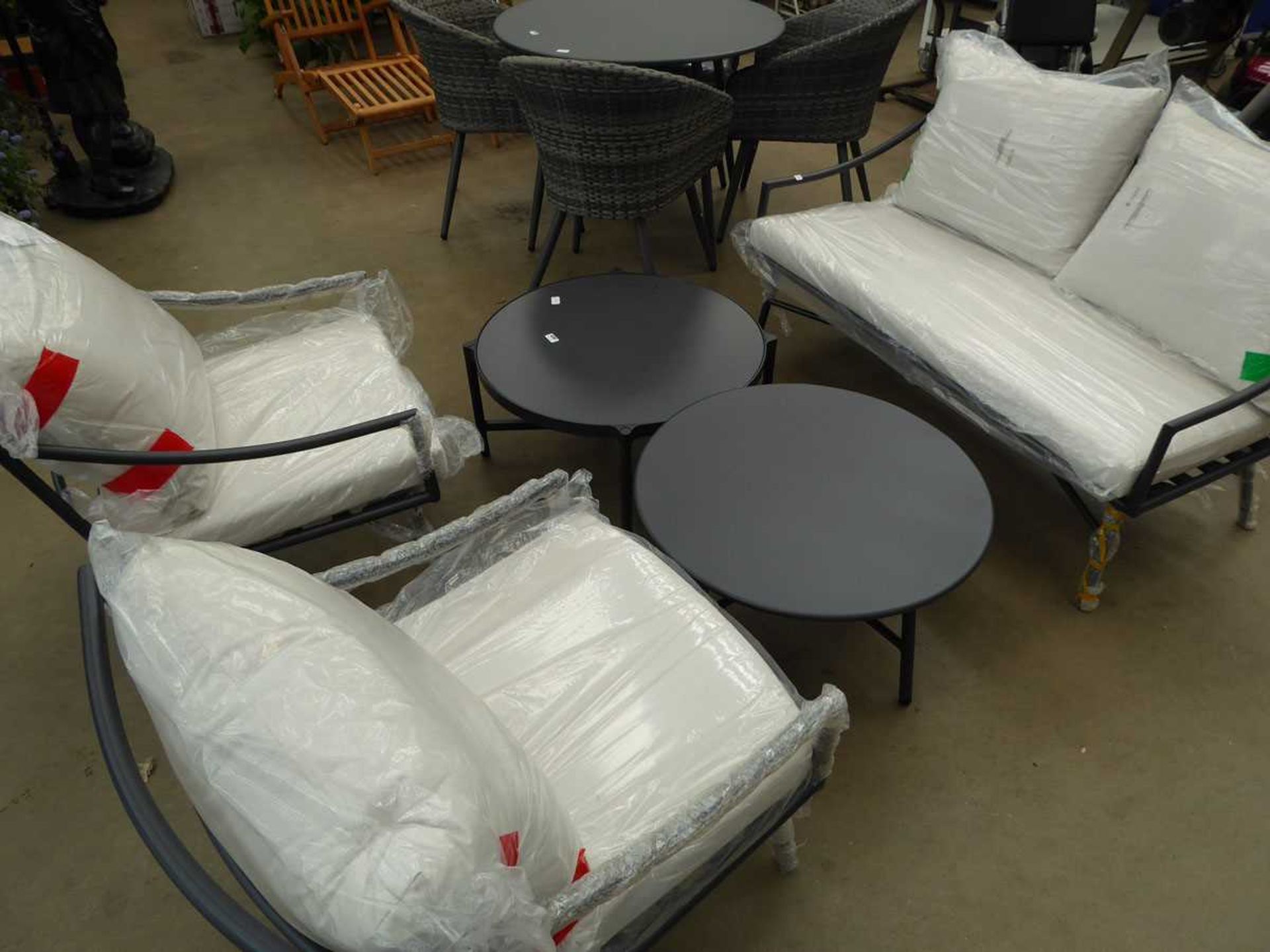 5 piece garden set consisting of two seater metal framed sofa, 2 metal framed chairs and 2 round