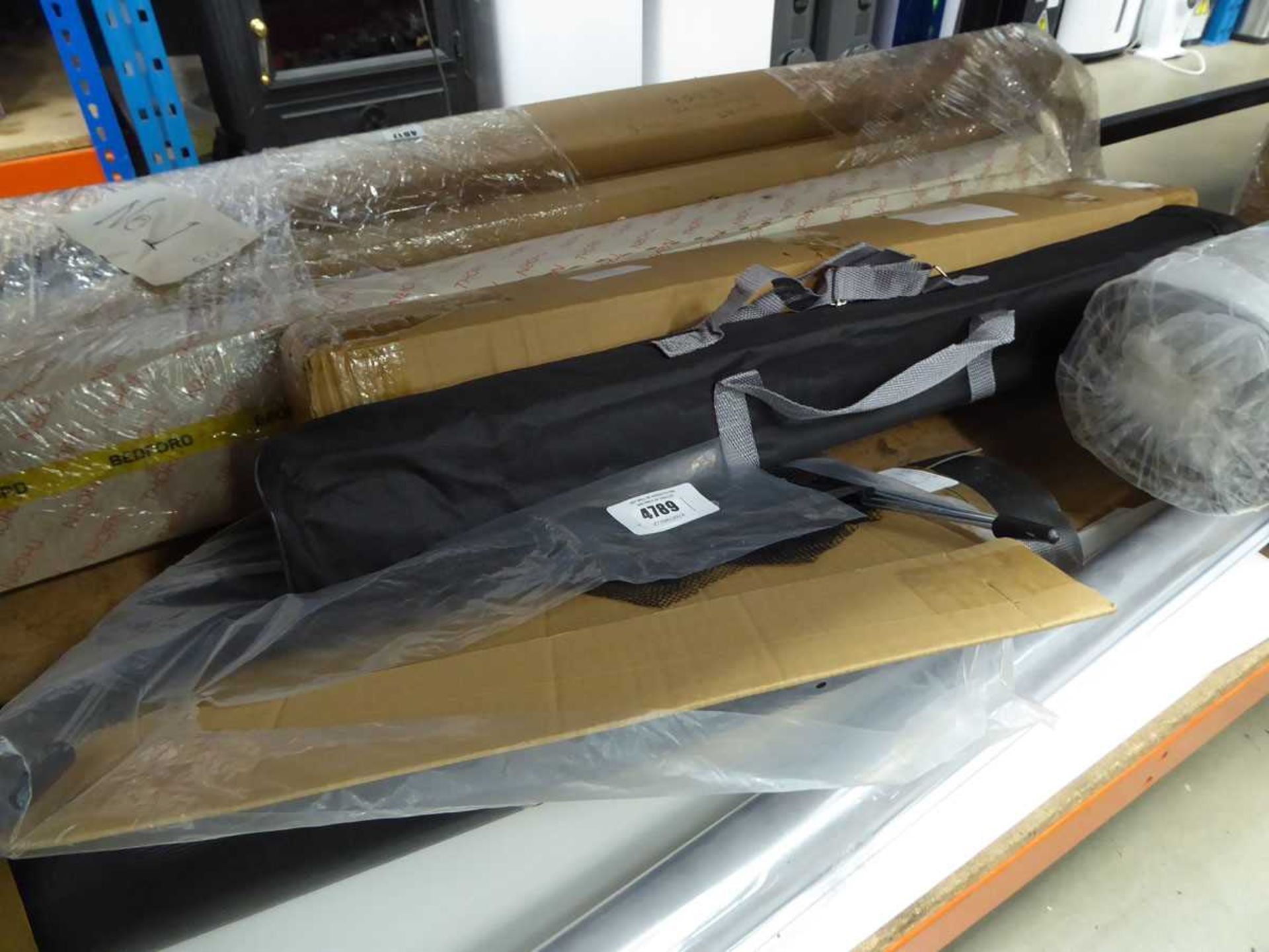 +VAT Half an under bay containing display screens, nets, silver packing material, barrier bases, - Image 2 of 3
