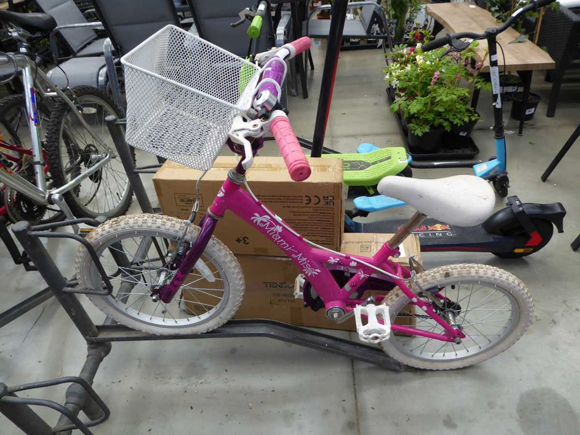 Pink and burgundy childs bike