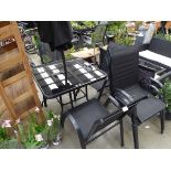 Small square glass topped, metal framed garden table complete with 5 black mesh garden chairs and