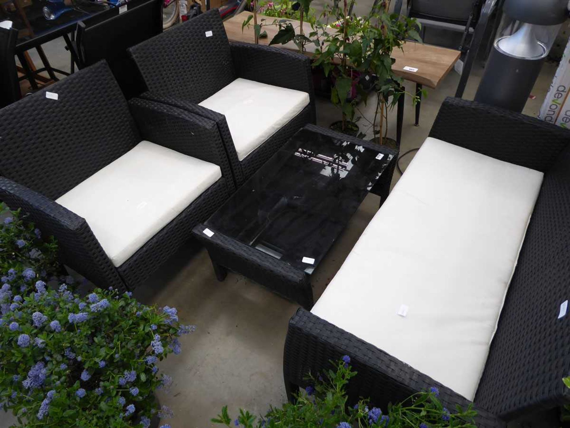 4 piece garden rattan set consisting of 2 seater sofa, 2 chairs and glass top coffee table