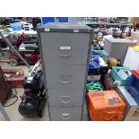 Grey metal filing cabinet containing gloves and tools including jigsaw, timing lights, punch sets,