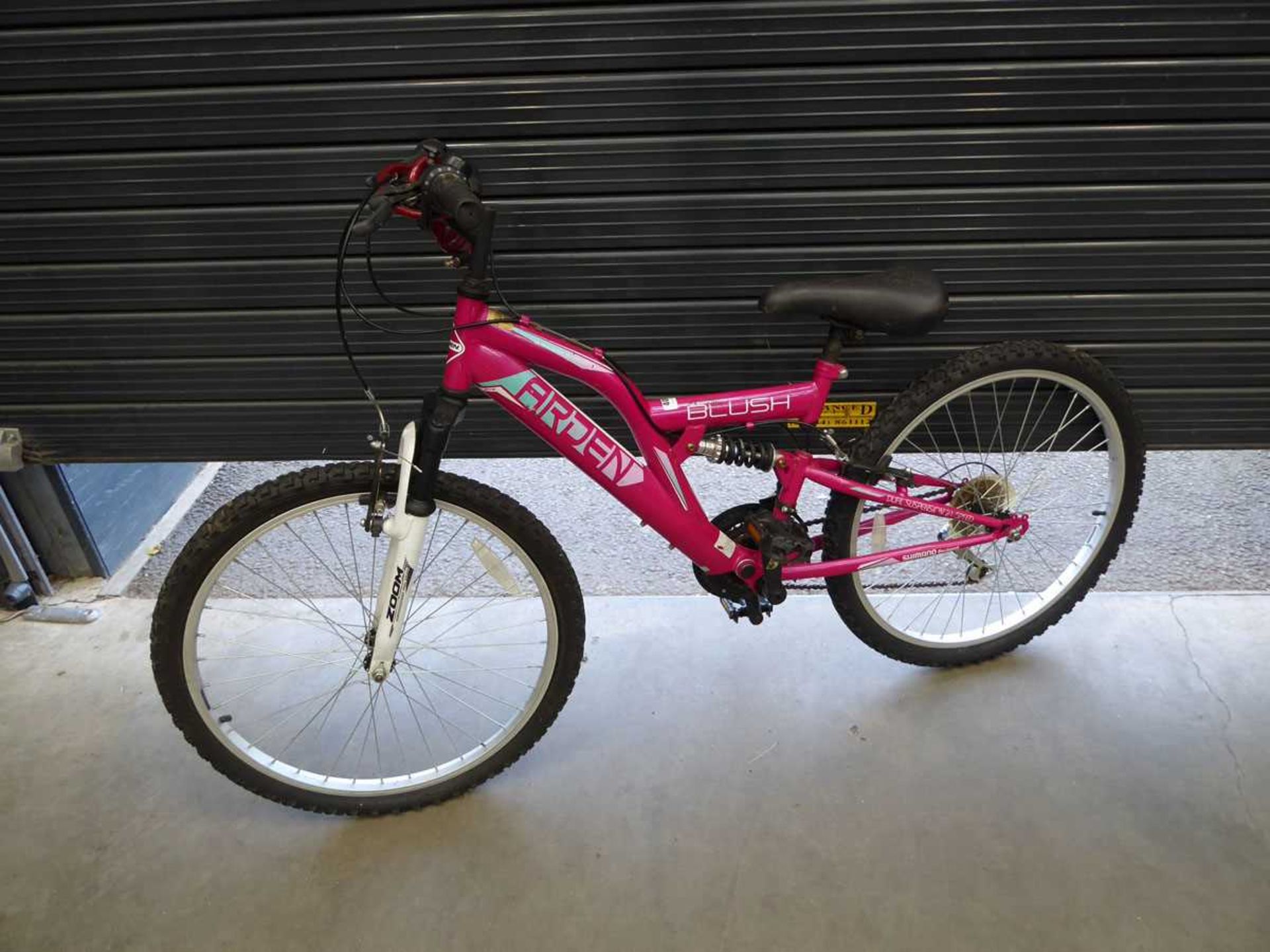 Youngsters pink mountain bike