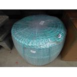 Large roll of rope and roll of material