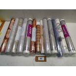 +VAT Quantity of wallpaper rolls in various designs plus a roll of clear vinyl