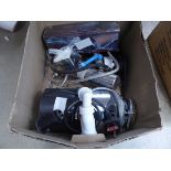 Box containing a macerator and other plumbing items