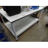 Large white 4 wheeled table