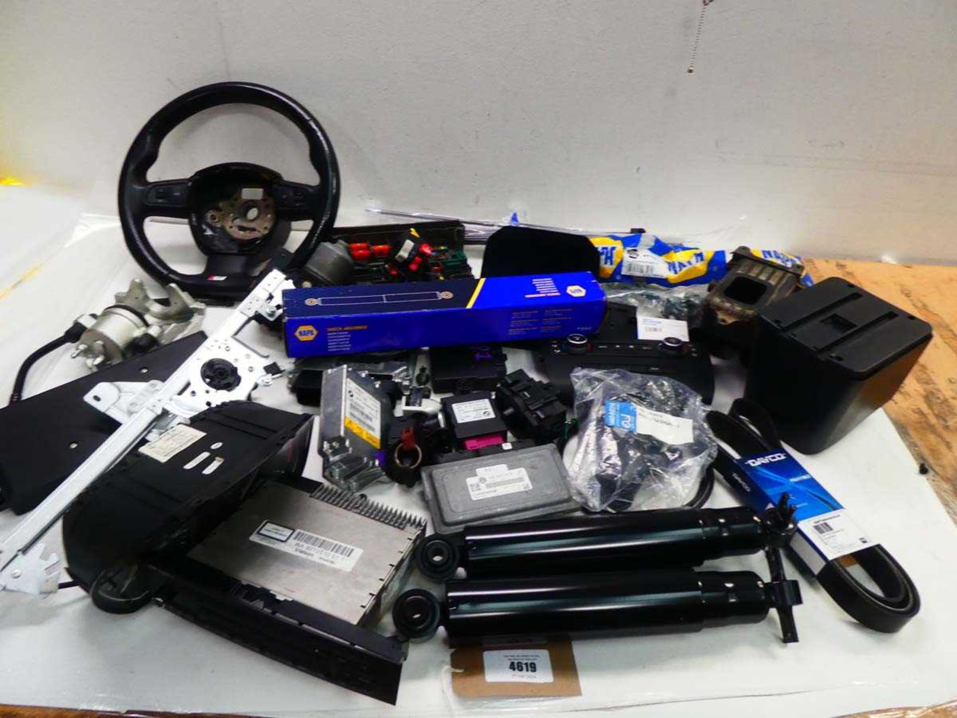 +VAT Box of various car parts to include steering wheel, air bag module, entertainment systems,