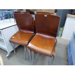 Approx 12 wooden seated chrome framed stacking chairs