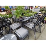 Rectangular metal framed glass topped table with 6 chairs, small round side table and 2 footstools