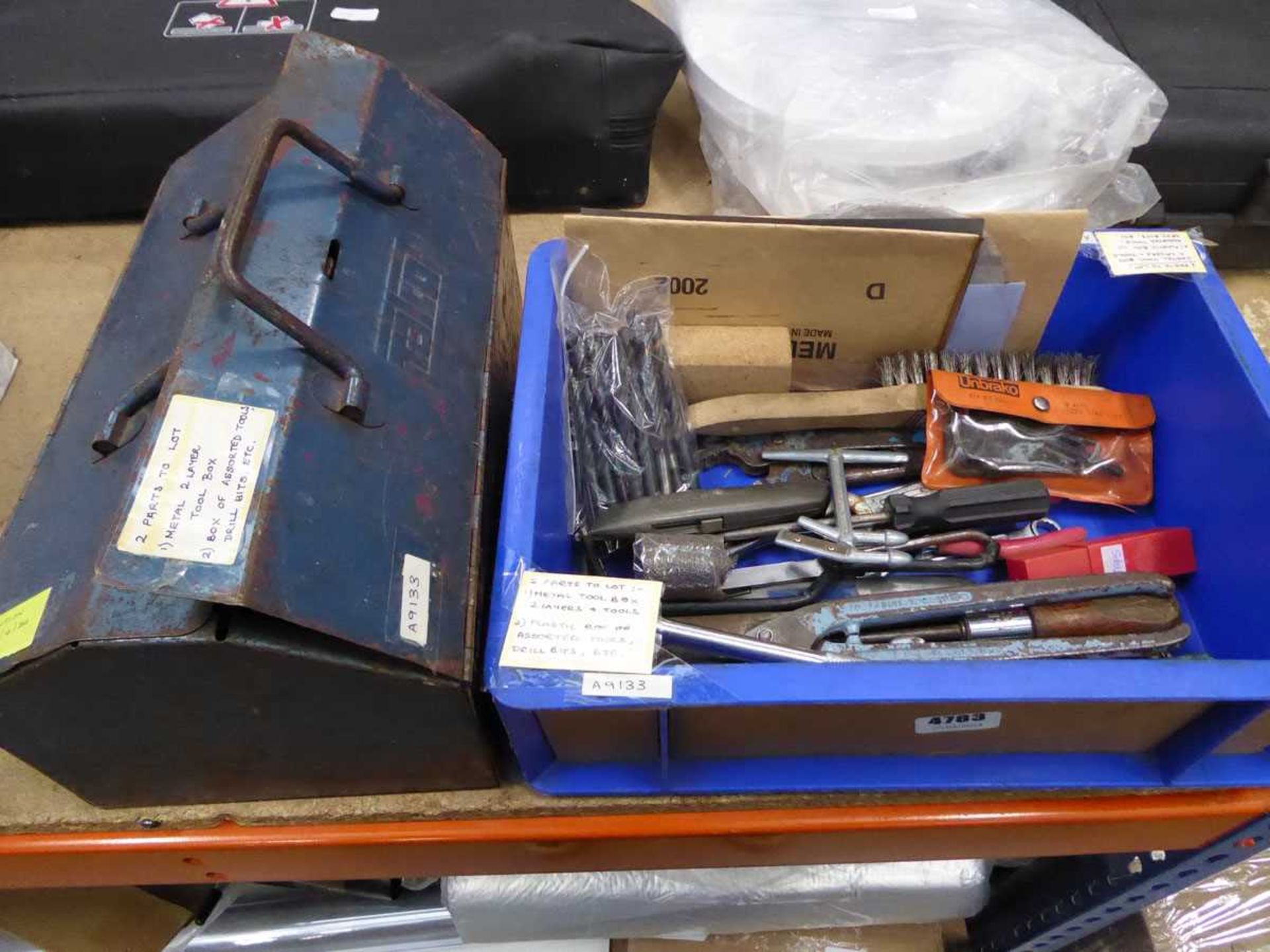 Small metal toolbox with assorted tools and plastic box of assorted tools including tin snips, drill