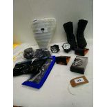 +VAT Motorcycle parts to include various gloves, boots, helmet mount kit, helmet headset, etc