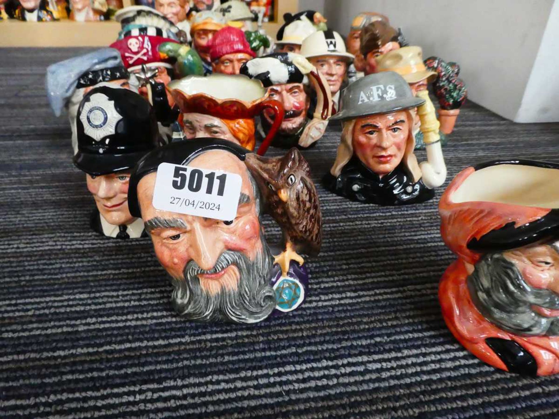 Approx. 21 small Character Jugs depicting Falstaff, policeman, wizard, air raid warden, soldier of