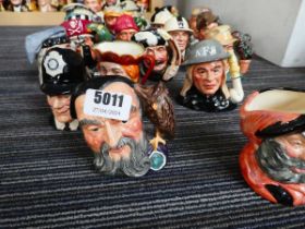 Approx. 21 small Character Jugs depicting Falstaff, policeman, wizard, air raid warden, soldier of