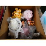 Box of piggy banks and other pig figures