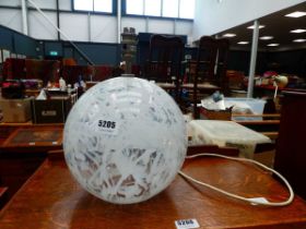Glass orb shaped table lamp